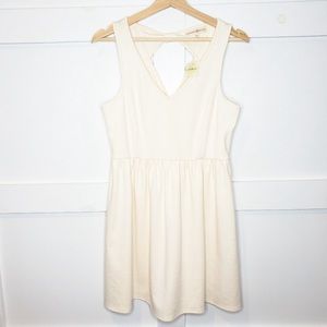 Cream bow back Altar’d State dress